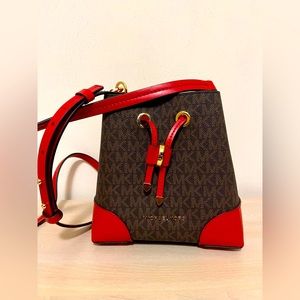 Michael Kors crossbody purse. Never used